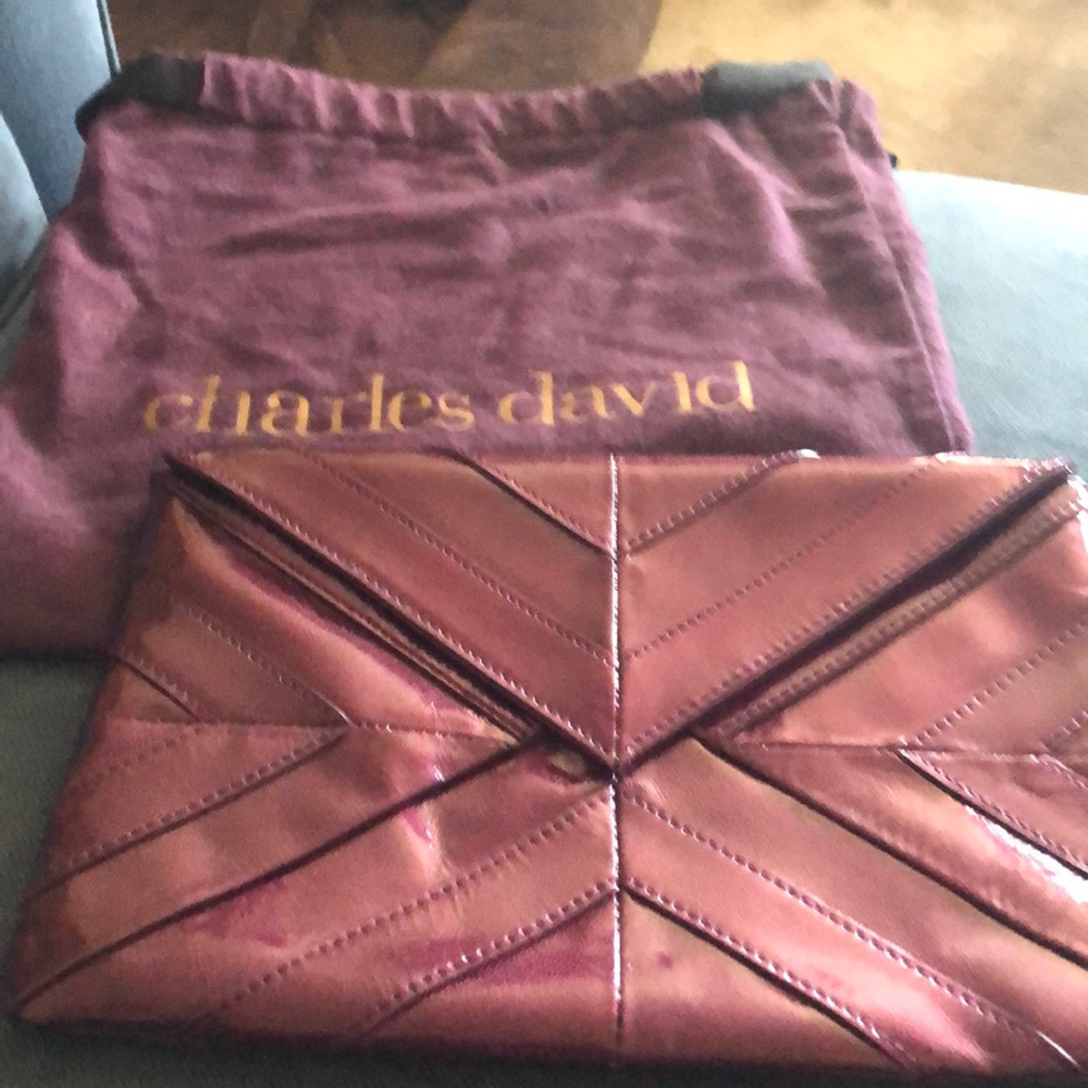 Charles David   Purple clutch In good shape